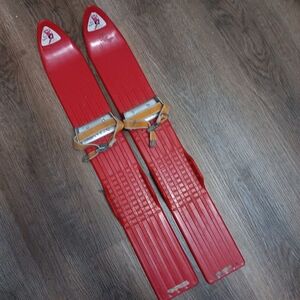 Vintage Red Skis with Tan Straps